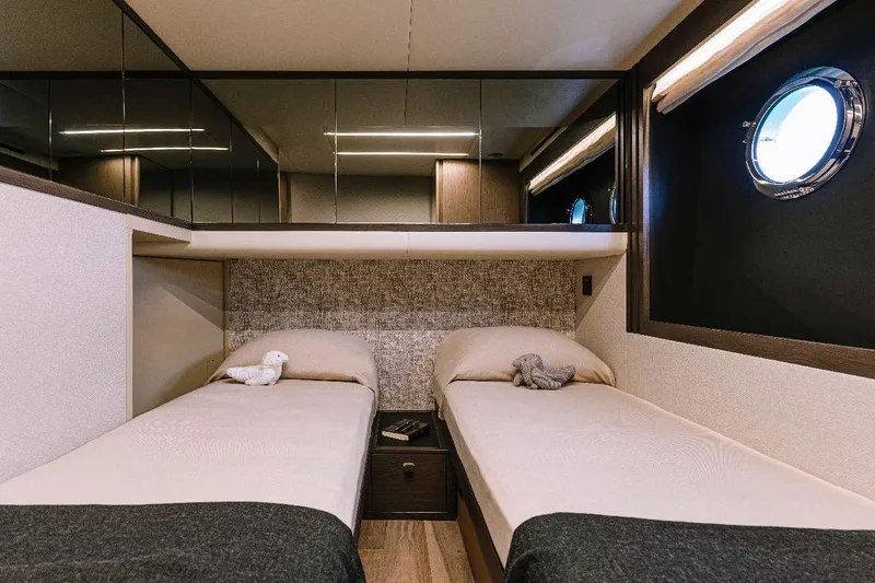  Yacht Photos Pics Luxurious twin cabin interior of 2026 Absolute 52 FLY yacht with modern design.
