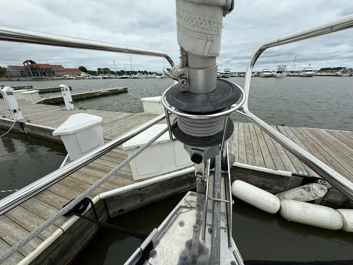 French Angel Yacht Photos Pics Bow of a 2003 Beneteau 393 sailboat docked at a marina.