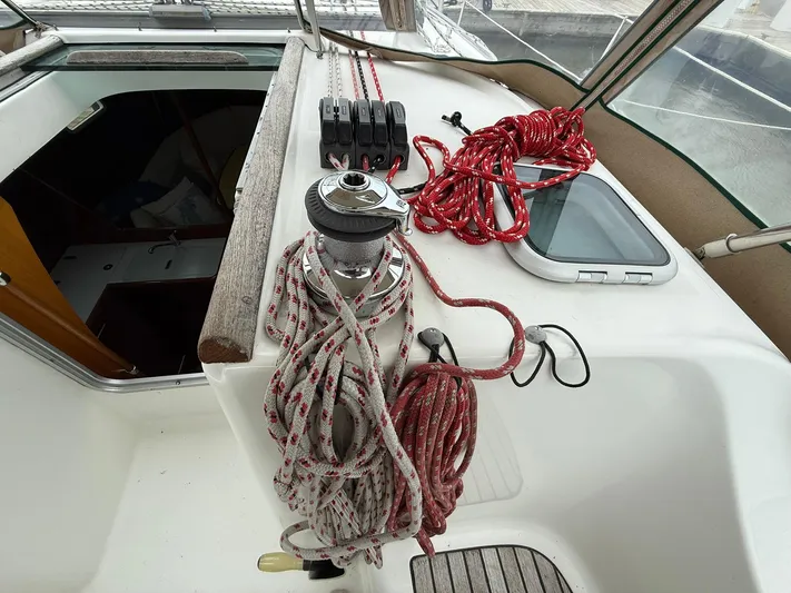 French Angel Yacht Photos Pics Deck of 2003 Beneteau 393 sailboat with ropes and winch.