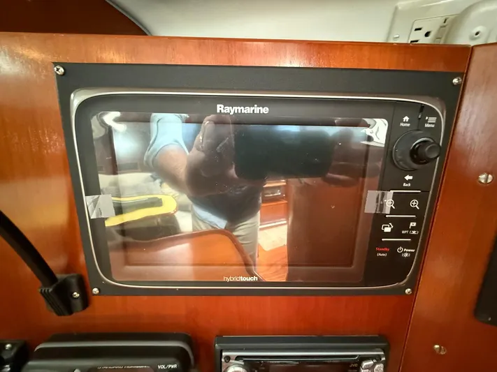 French Angel Yacht Photos Pics Raymarine navigation system on 2003 Beneteau 393 yacht, featuring hybrid touch controls.