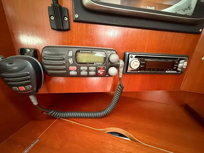 French Angel Yacht Photos Pics VHF radio and stereo system on 2003 Beneteau 393 yacht interior.