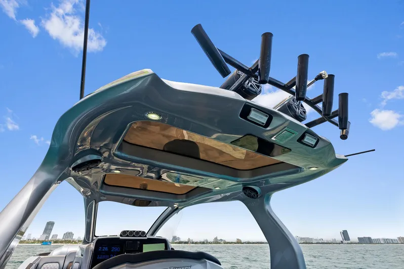 Baby Yacht Photos Pics 2018 Deep Impact 399 Cabin boat with advanced roof features and rod holders.