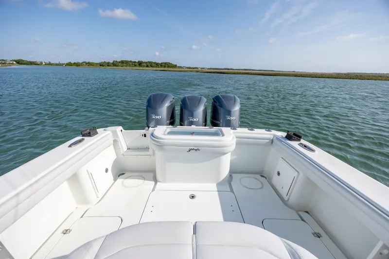  Yacht Photos Pics 2019 Yellowfin 36 boat with triple engines on calm water.