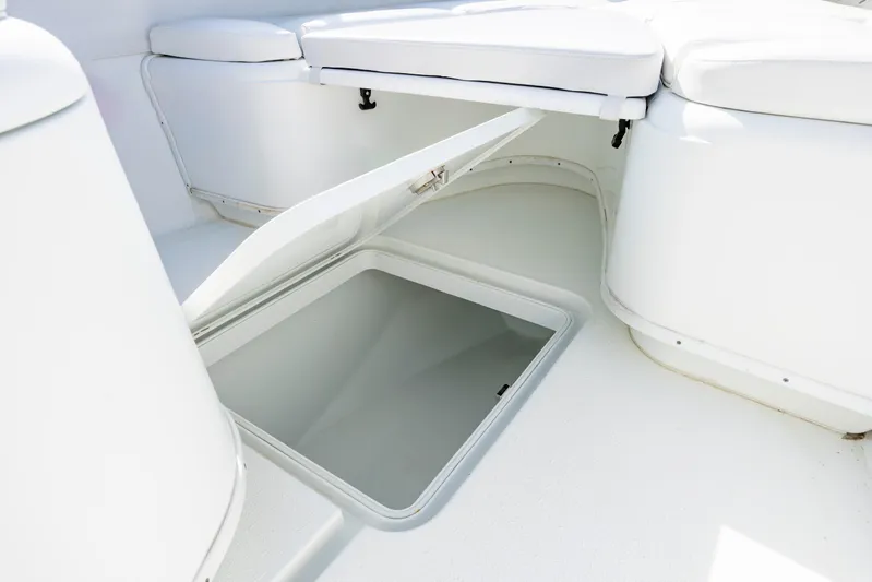  Yacht Photos Pics 2019 Yellowfin 36 boat interior with open storage compartment.