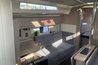 2023 Hanse 388 yacht interior with modern seating and natural light.