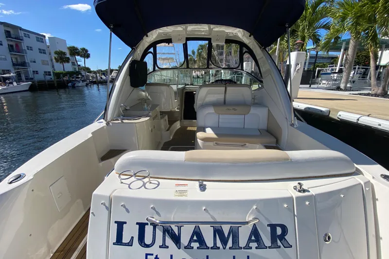  Yacht Photos Pics 2008 Sea Ray Sundancer 330 docked, featuring spacious seating and elegant design.