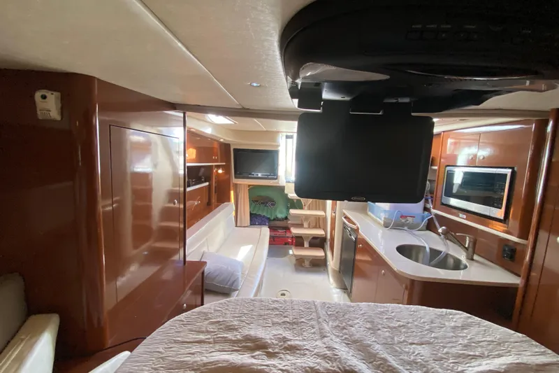  Yacht Photos Pics Interior of 2008 Sea Ray Sundancer 330 yacht with modern amenities and wood finishes.