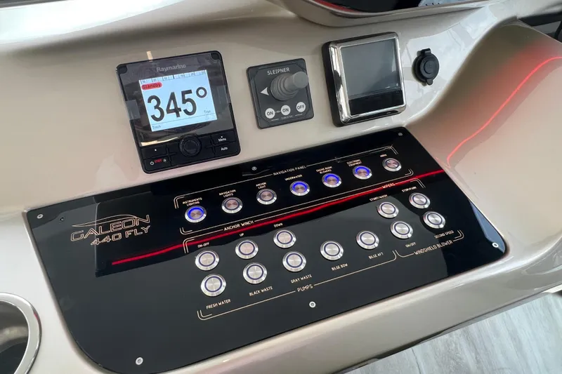  Yacht Photos Pics Control panel of 2024 Galeon 440 Fly yacht with navigation and system controls.