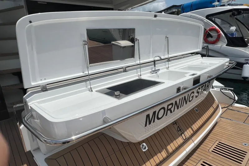  Yacht Photos Pics 2024 Galeon 440 Fly yacht with open deck storage labeled "Morning Star."