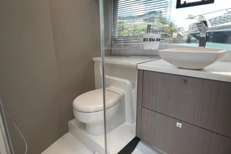  Yacht Photos Pics Modern bathroom in 2024 Galeon 440 Fly yacht with sleek fixtures and elegant design.