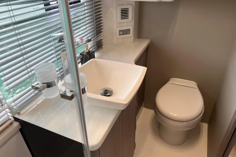  Yacht Photos Pics Modern bathroom in 2024 Galeon 440 Fly yacht with sleek sink and toilet.
