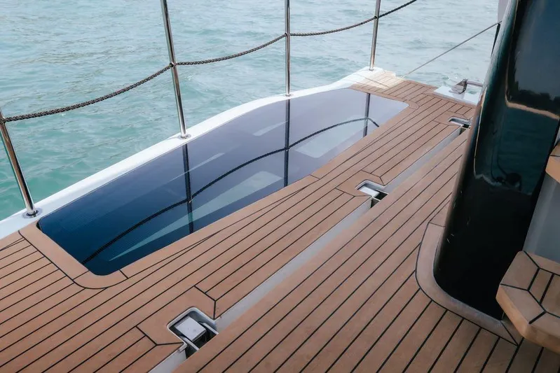  Yacht Photos Pics Luxury deck of 2024 Galeon 440 Fly yacht with sleek wood finish.