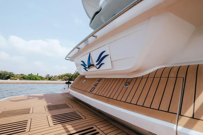  Yacht Photos Pics 2024 Galeon 440 Fly yacht with teak deck, docked by the water.