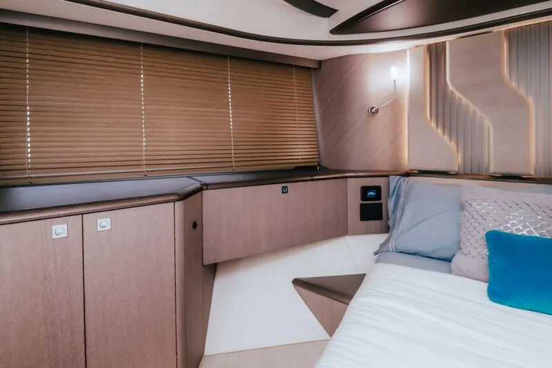  Yacht Photos Pics Luxurious interior of 2024 Galeon 440 Fly yacht with modern design and cozy bedding.