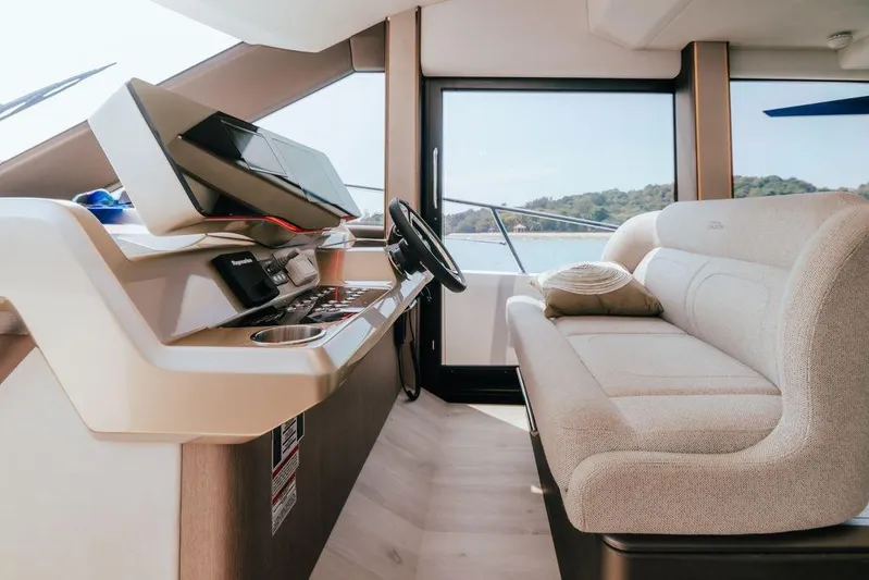  Yacht Photos Pics 2024 Galeon 440 Fly yacht interior with modern helm and comfortable seating.