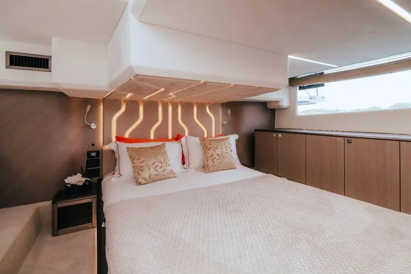  Yacht Photos Pics Luxurious bedroom interior of 2024 Galeon 440 Fly yacht with modern design.
