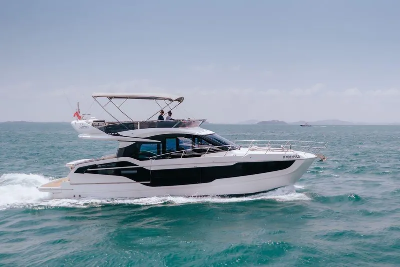  Yacht Photos Pics 2024 Galeon 440 Fly yacht cruising on open sea.