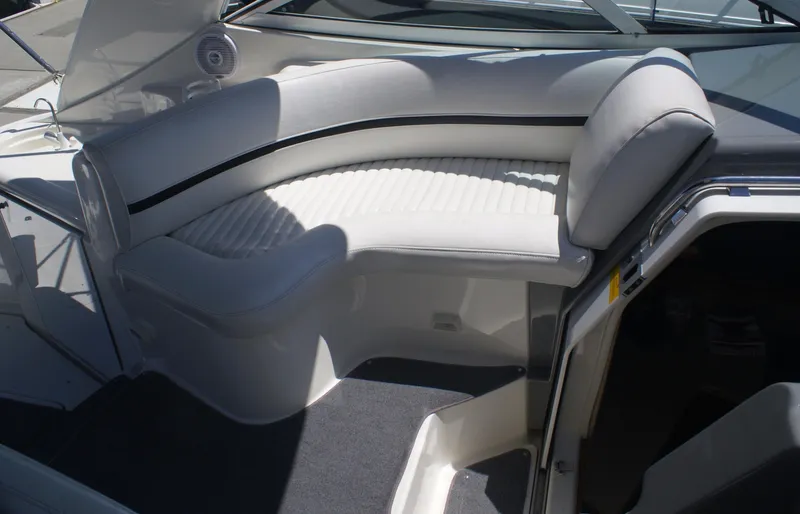 Grandcru Yacht Photos Pics Interior of 2005 Cruisers Yachts 340 Express with white seating area.