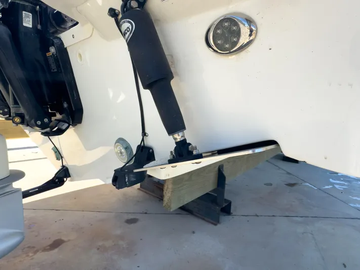 Pearl Yacht Photos Pics 2018 Boston Whaler 315 Conquest boat engine and trim tab detail.