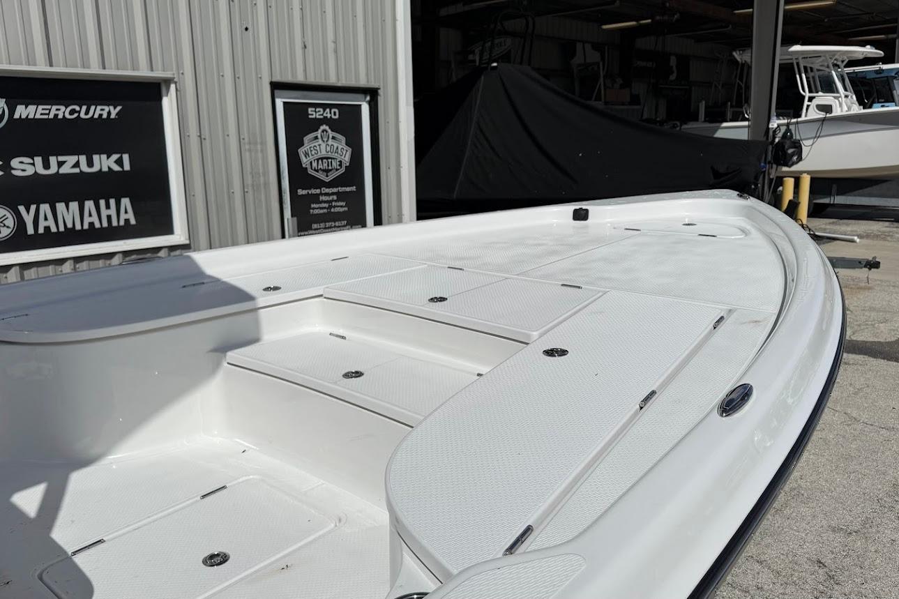 2026 Blazer PureBay 2400 boat displayed at West Coast Marine dealership.