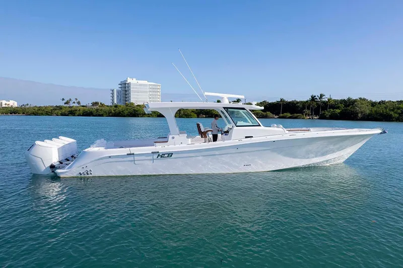  Yacht Photos Pics Manufacturer Provided Image: 2026 HCB 48 Campeon boat on calm water, clear sky, modern design.