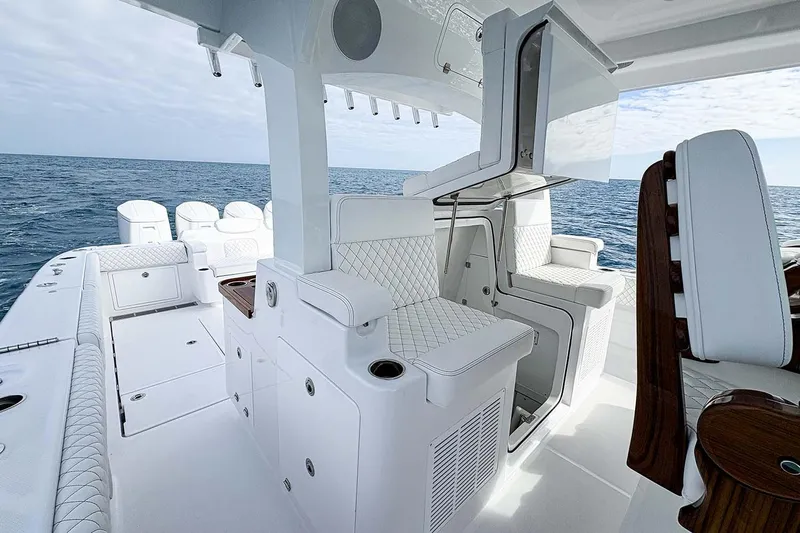  Yacht Photos Pics Manufacturer Provided Image: 2026 HCB 48 Campeon luxury boat interior with white seating and ocean view.