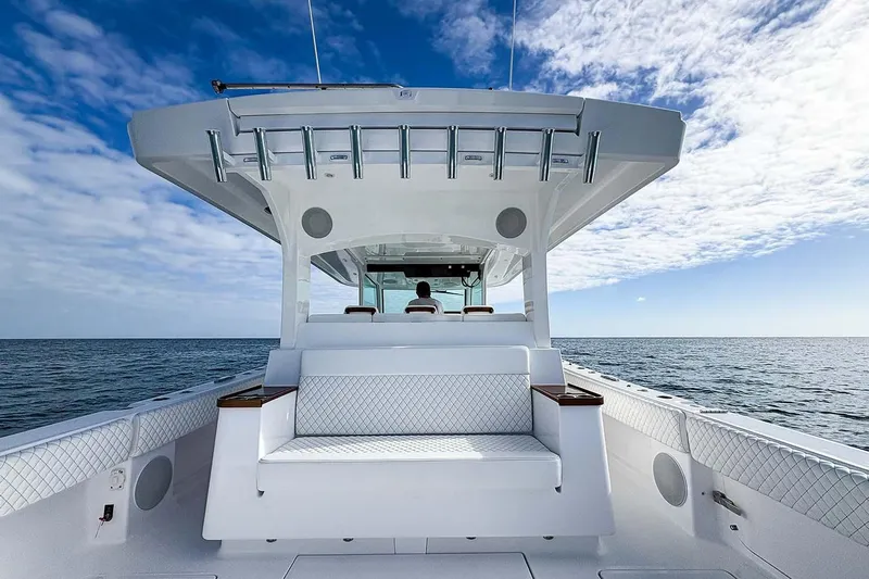  Yacht Photos Pics Manufacturer Provided Image: 2026 HCB 48 Campeon boat on open sea under blue sky.