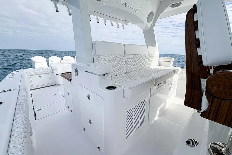  Yacht Photos Pics Manufacturer Provided Image: Luxurious 2026 HCB 48 Campeon boat interior with white seating and ocean view.