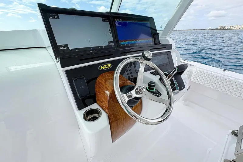  Yacht Photos Pics Manufacturer Provided Image: Helm of 2026 HCB 48 Campeon boat with advanced navigation displays and controls.
