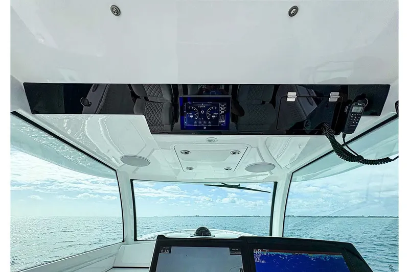  Yacht Photos Pics Manufacturer Provided Image: Interior view of 2026 HCB 48 Campeon boat cockpit with navigation screens.
