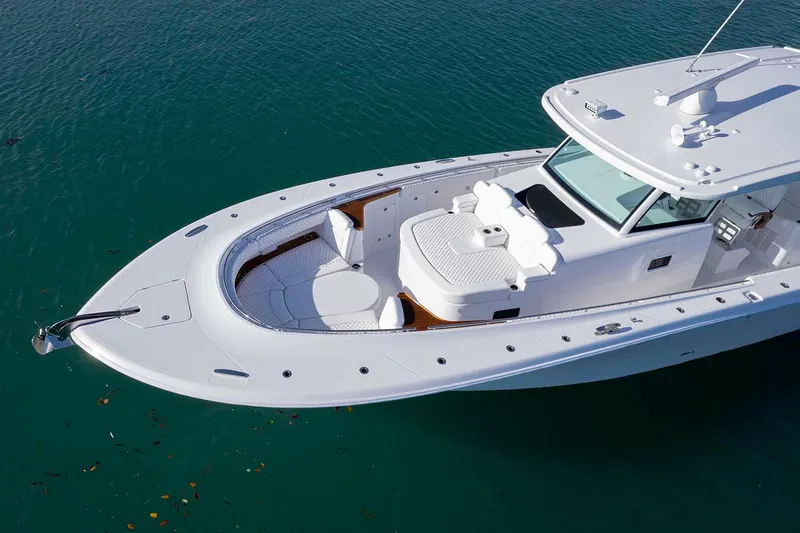  Yacht Photos Pics Manufacturer Provided Image: 2026 HCB 48 Campeon boat on calm water, showcasing sleek design and spacious deck.