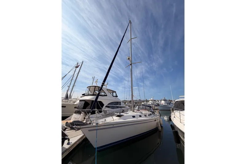 Seaduction Yacht Photos Pics 2005 Catalina 42 MkII sailboat docked at marina under clear blue sky.