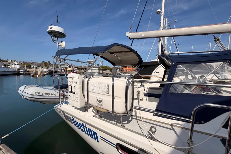 Seaduction Yacht Photos Pics Catalina 42 MkII sailboat, 2005 model, docked with lifeboat and radar equipment.