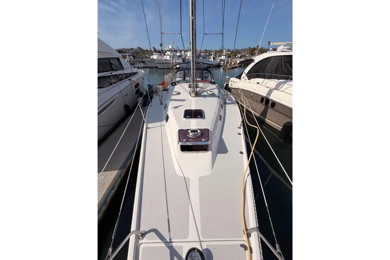 Seaduction Yacht Photos Pics 2005 Catalina 42 MkII sailboat docked in a marina, surrounded by other boats.