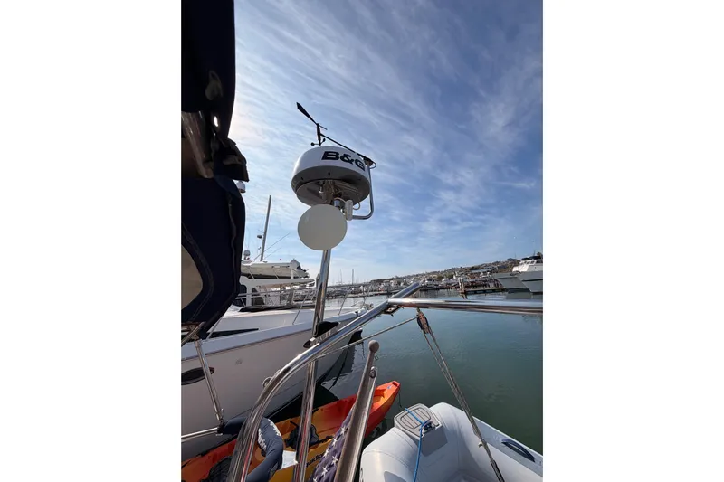 Seaduction Yacht Photos Pics Catalina 42 MkII sailboat, 2005 model, docked in marina under clear blue sky.
