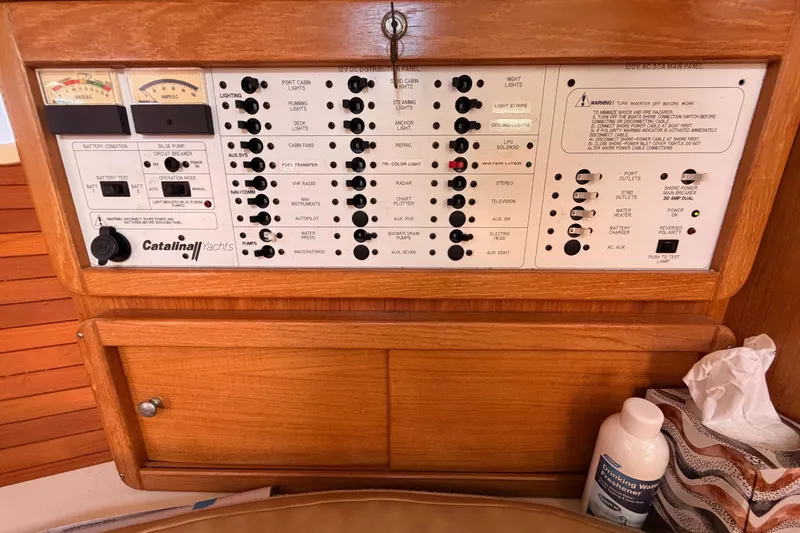 Seaduction Yacht Photos Pics Control panel of a 2005 Catalina 42 MkII yacht with various switches and gauges.
