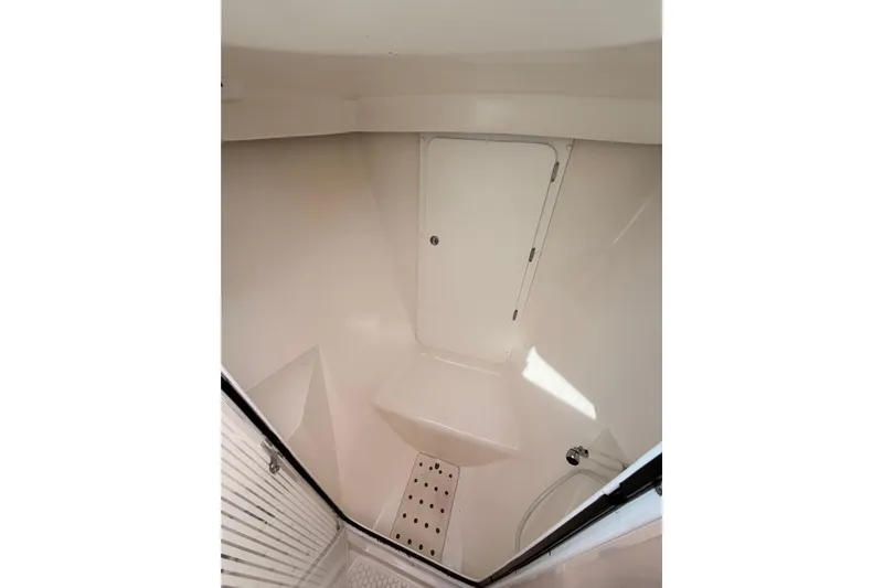 Seaduction Yacht Photos Pics Interior of 2005 Catalina 42 MkII sailboat, featuring a compact, white shower area.