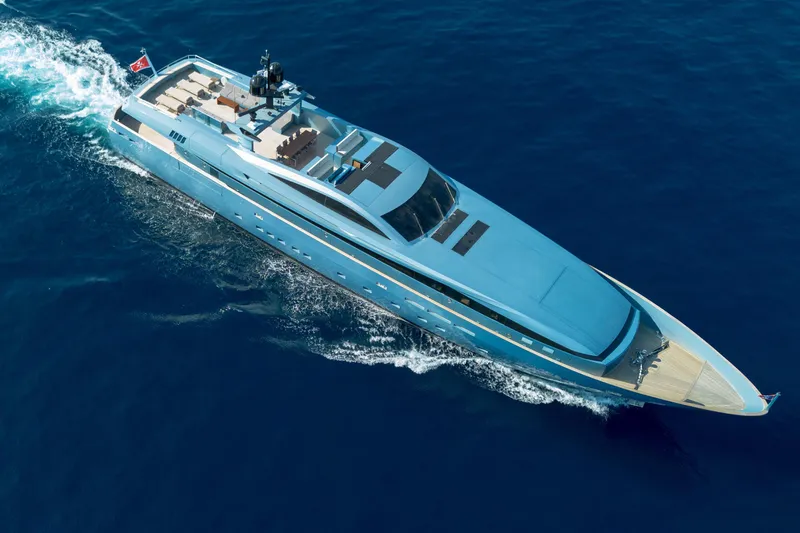 Queen Blue Yacht Photos Pics Aerial view of 2007 Baglietto 44 Fast yacht cruising on open sea.