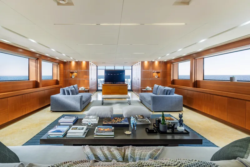 Queen Blue Yacht Photos Pics Luxurious interior of 2007 Baglietto 44 Fast yacht with modern furnishings and ocean views.