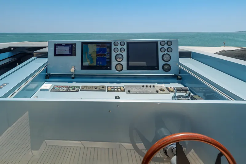 Queen Blue Yacht Photos Pics Control panel of 2007 Baglietto 44 Fast yacht with ocean view.
