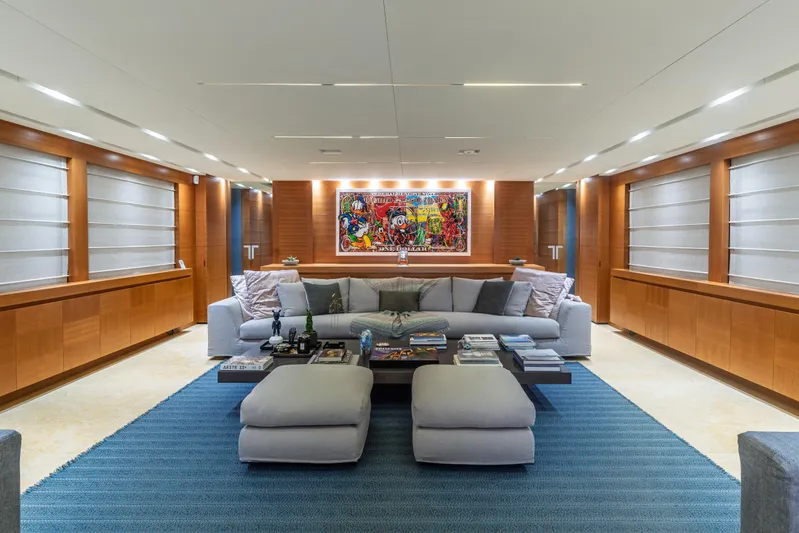 Queen Blue Yacht Photos Pics Luxurious interior of 2007 Baglietto 44 Fast yacht with modern decor and artwork.