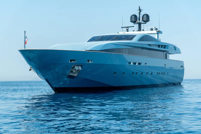 Queen Blue Yacht Photos Pics Luxury 2007 Baglietto 44 Fast yacht on calm blue sea.
