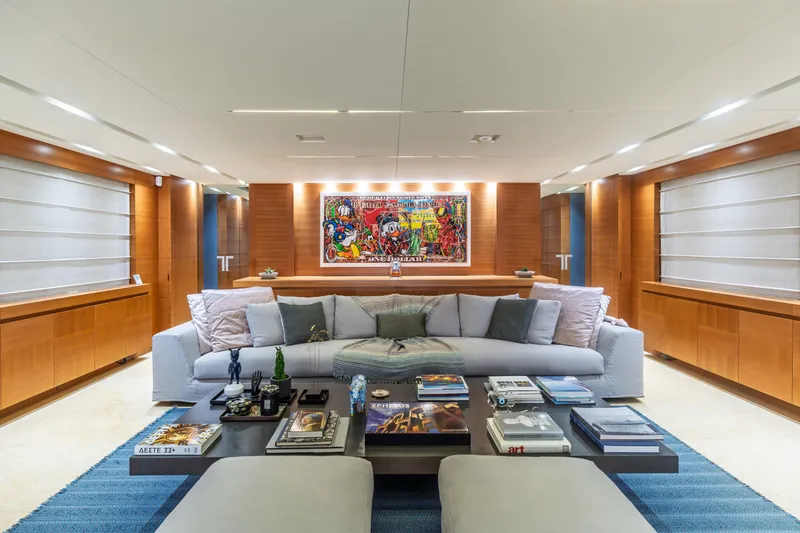 Queen Blue Yacht Photos Pics Luxurious interior of 2007 Baglietto 44 Fast yacht with modern decor and vibrant artwork.