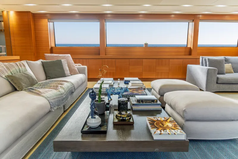 Queen Blue Yacht Photos Pics Luxurious interior of 2007 Baglietto 44 Fast yacht with elegant seating and ocean view.