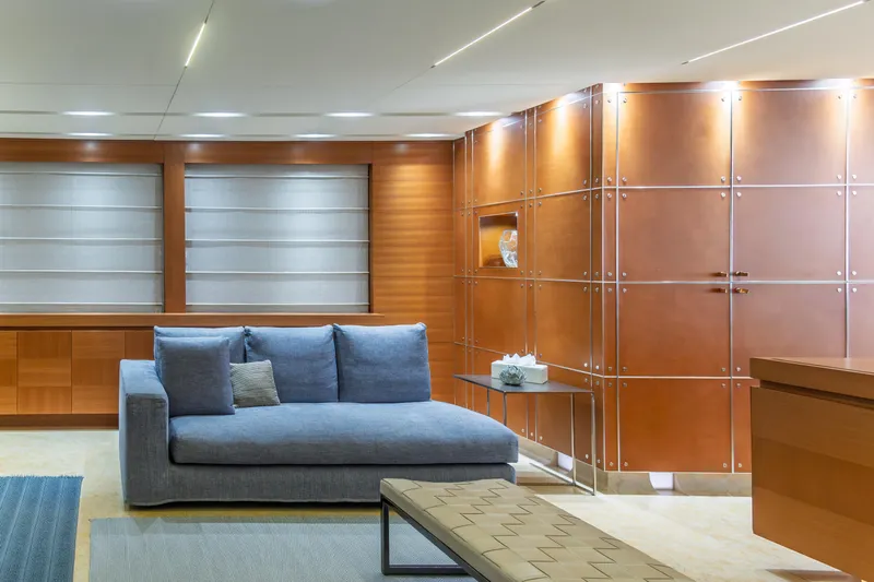 Queen Blue Yacht Photos Pics Luxurious interior of 2007 Baglietto 44 Fast yacht with modern furnishings and wood paneling.