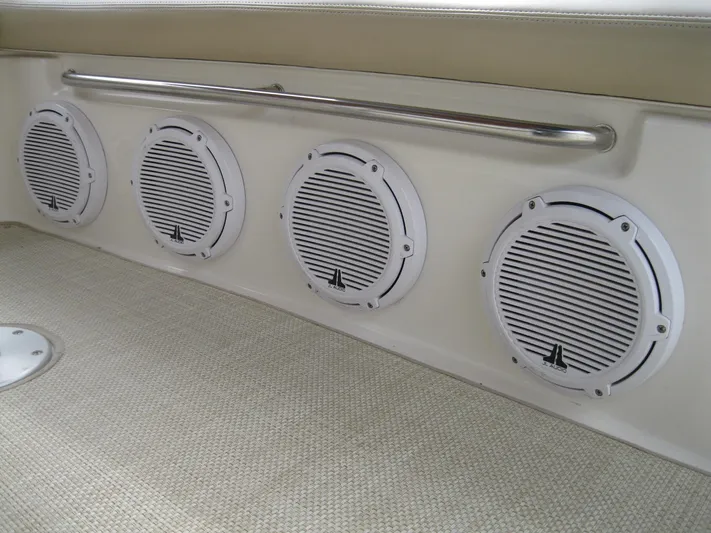  Yacht Photos Pics Four white speakers on a 2008 Sea Ray 330 Sundancer boat interior.