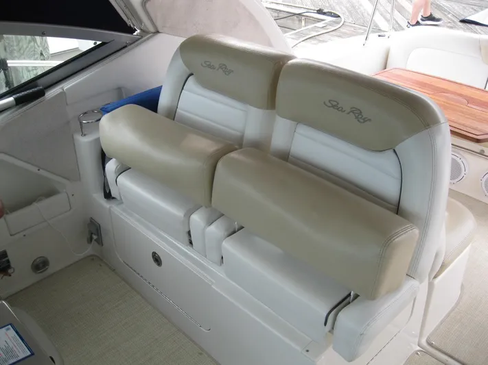  Yacht Photos Pics 2008 Sea Ray 330 Sundancer interior seating with beige and white upholstery.