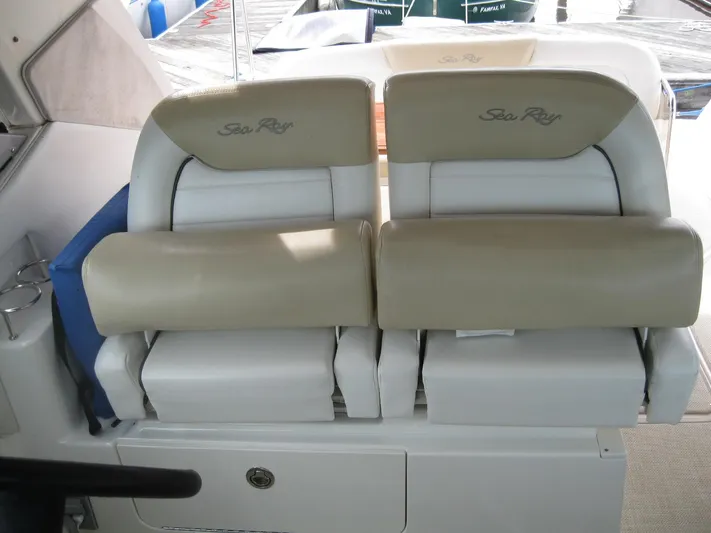  Yacht Photos Pics 2008 Sea Ray 330 Sundancer boat seats, beige and white, with Sea Ray logo.