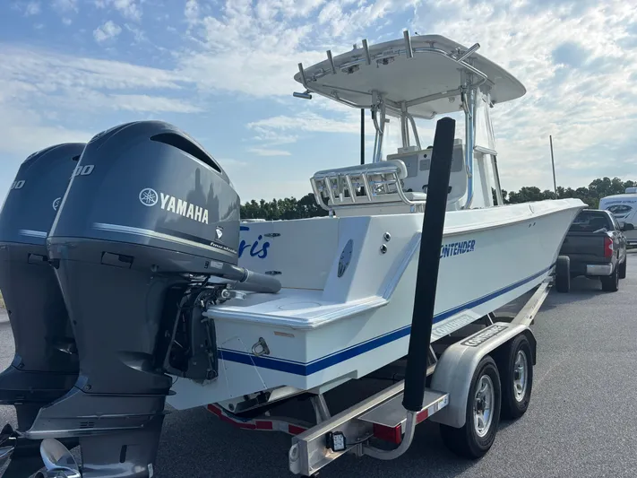  Yacht Photos Pics 2012 Contender 28 Sport boat with dual Yamaha engines on a trailer.