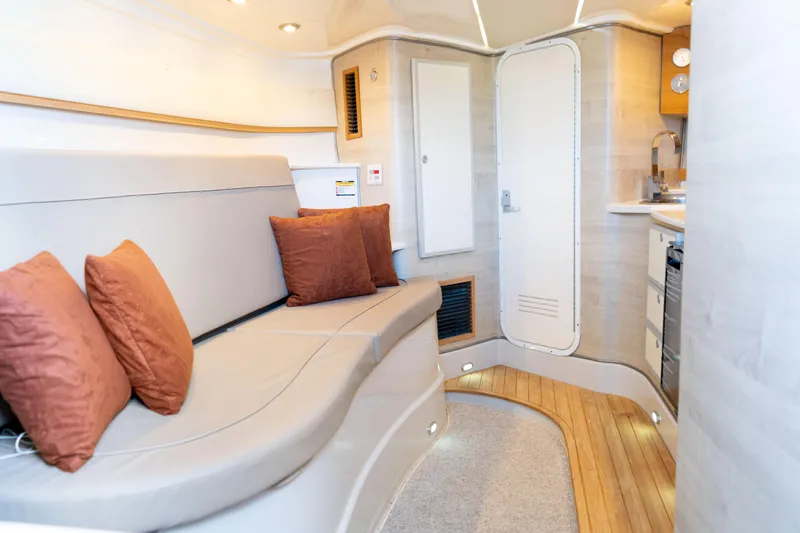  Yacht Photos Pics Interior of 2018 Pronautica 1260 Super Sport yacht with modern seating and kitchen area.